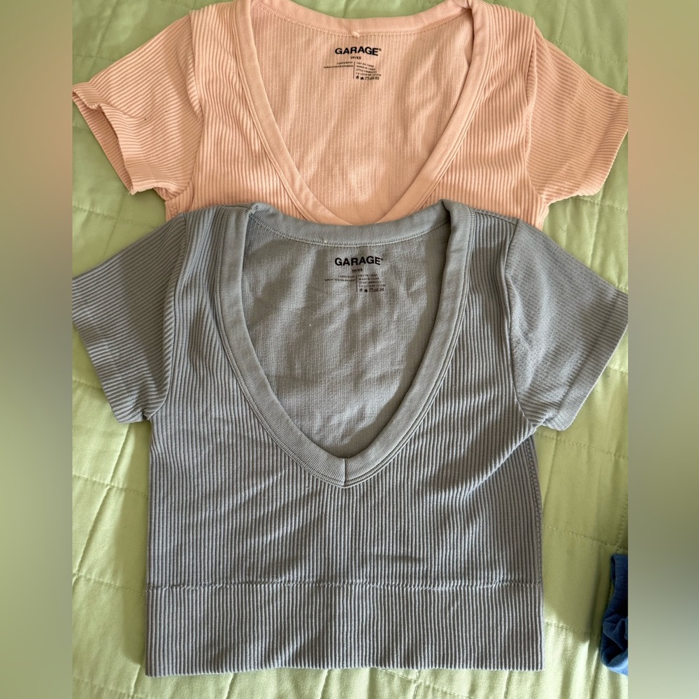 Two Garage XS crop tops. Pink and Light Blue - worn but in good shape